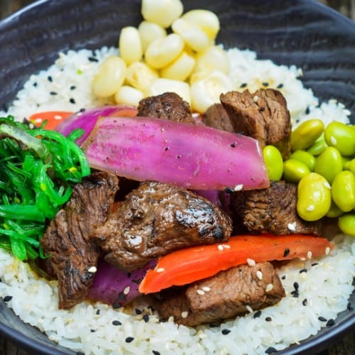 Poke Lomo Saltado with Our Spicy Mayo.