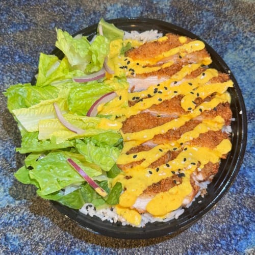 Panko breaded chicken with huancaina sauce.